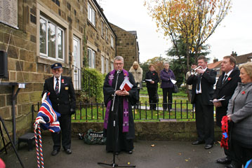 Photo 6  - 2013 Normanby Remembrance Day - Alan Stewart plays the Last Post