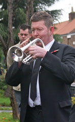 Photo 9  - 2013 Normanby Remembrance Day - Alan Stewart (Marske Brass Band) plays the Reveille