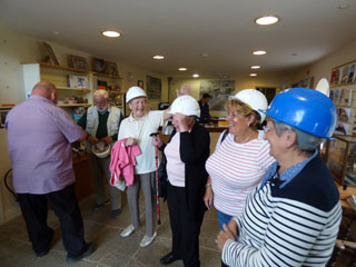 Photo 13  - Cleveland Ironstone Mining Museum - Tour Guide Adjusts Fit of Hard Hat for Keith Womack