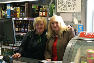 Photo 14  - Normanby Co operative Society - Store Staff - 
All the ladies Were Very Sad that the Co-op Is Closing -  - but Managed a Smile for Us. - 
Margaret Dakin and Trish Lane.