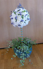 Photo 3  - Flower Festival Display 1 -  Creation: "God created Heaven and Earth",  Genesis 1 - "Sun and Moon" arranged by Joyce French