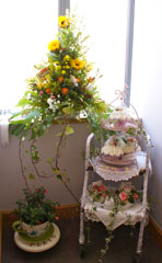 Photo 5  - Flower Festival Display 3 - Tea Trolley and Window - sponsored and arranged by Pop In - Window by Ash Green