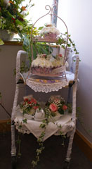 Photo 6  - Flower Festival Display 3 - Tea Trolley and Window - sponsored and arranged by Pop In - Window by Ash Green