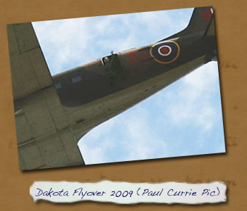 2009 Exhibition: RAF BofBMF - Airman waving from Douglas Dakota Flyover
        (Sorry- No Larger Image Available)